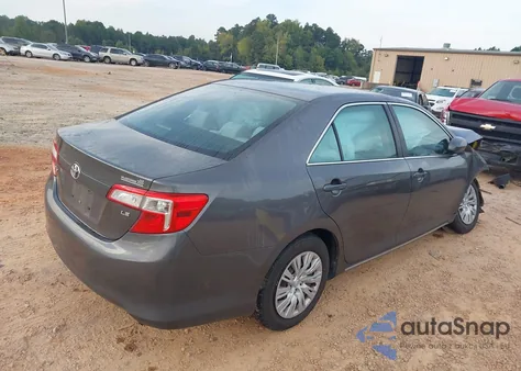 2014 Toyota Camry Le z USA, uszkodzony, nr VIN 4T4BF1FK1ER422057